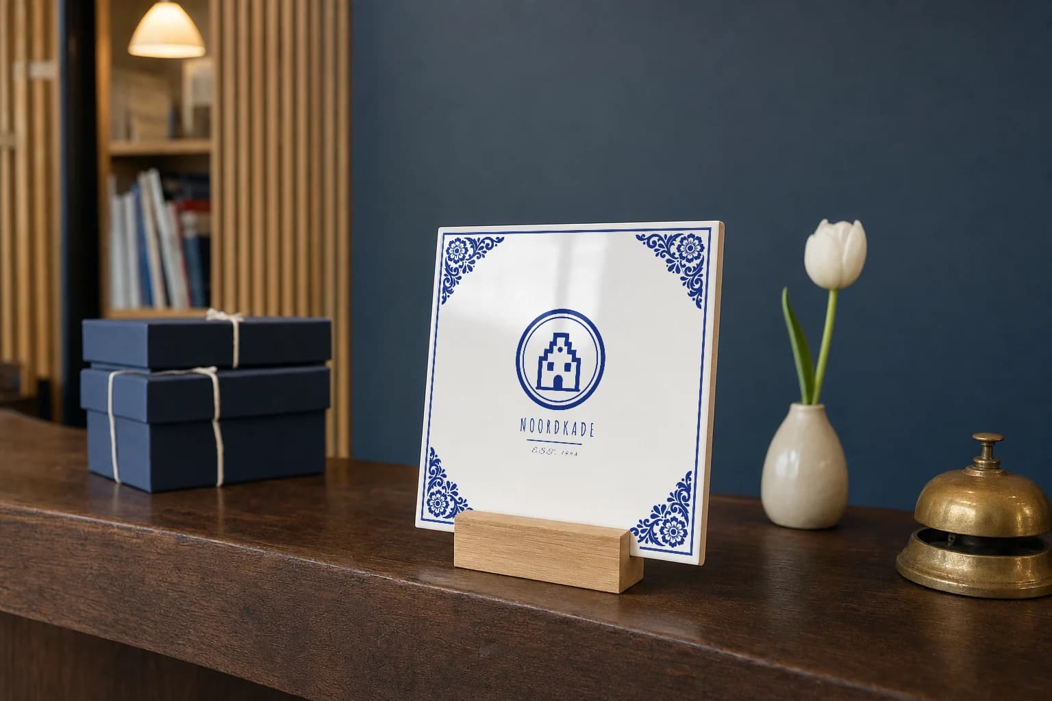Delft Blue logo tile in an oak holder on an office reception desk