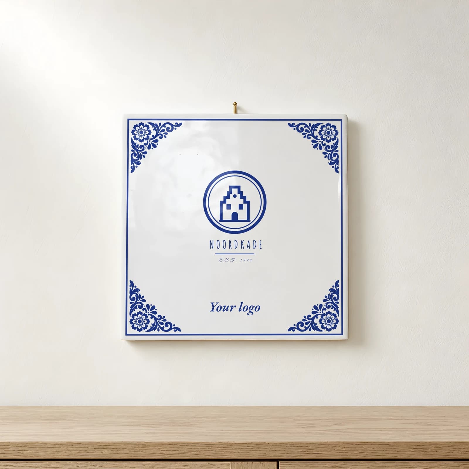 Delft Blue logo tile on the wall